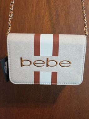 bebe -Beige Canvas Crossbody with Brown and Chain Woven With Leather Strap.